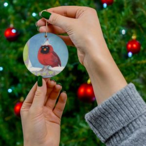 Cardinal In The Snow Round Ceramic Ornaments